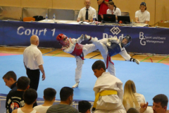 Mykhailo-Uminskyi-blaue-Weste-scaled